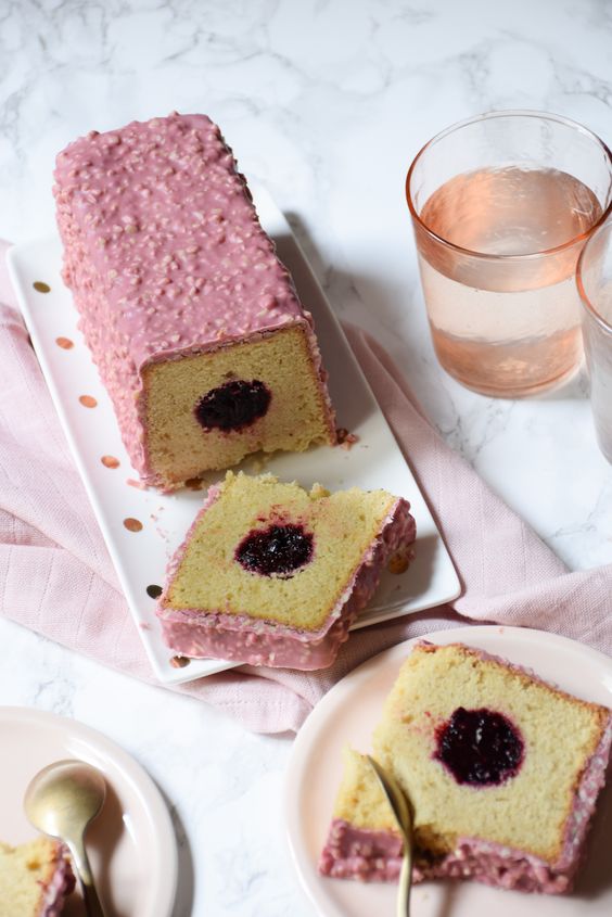 Vanilla cake, red fruit insert & Ruby rock icing