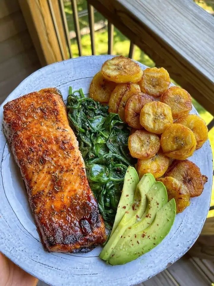 Pan-Seared Salmon with Plantains, Sautéed Spinach, and Avocado