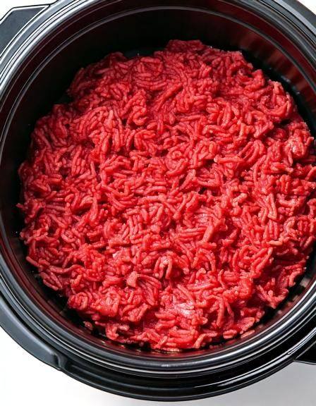 Put raw ground beef in a slow cooker with these 4 ingredients. It’s comfort food perfection.