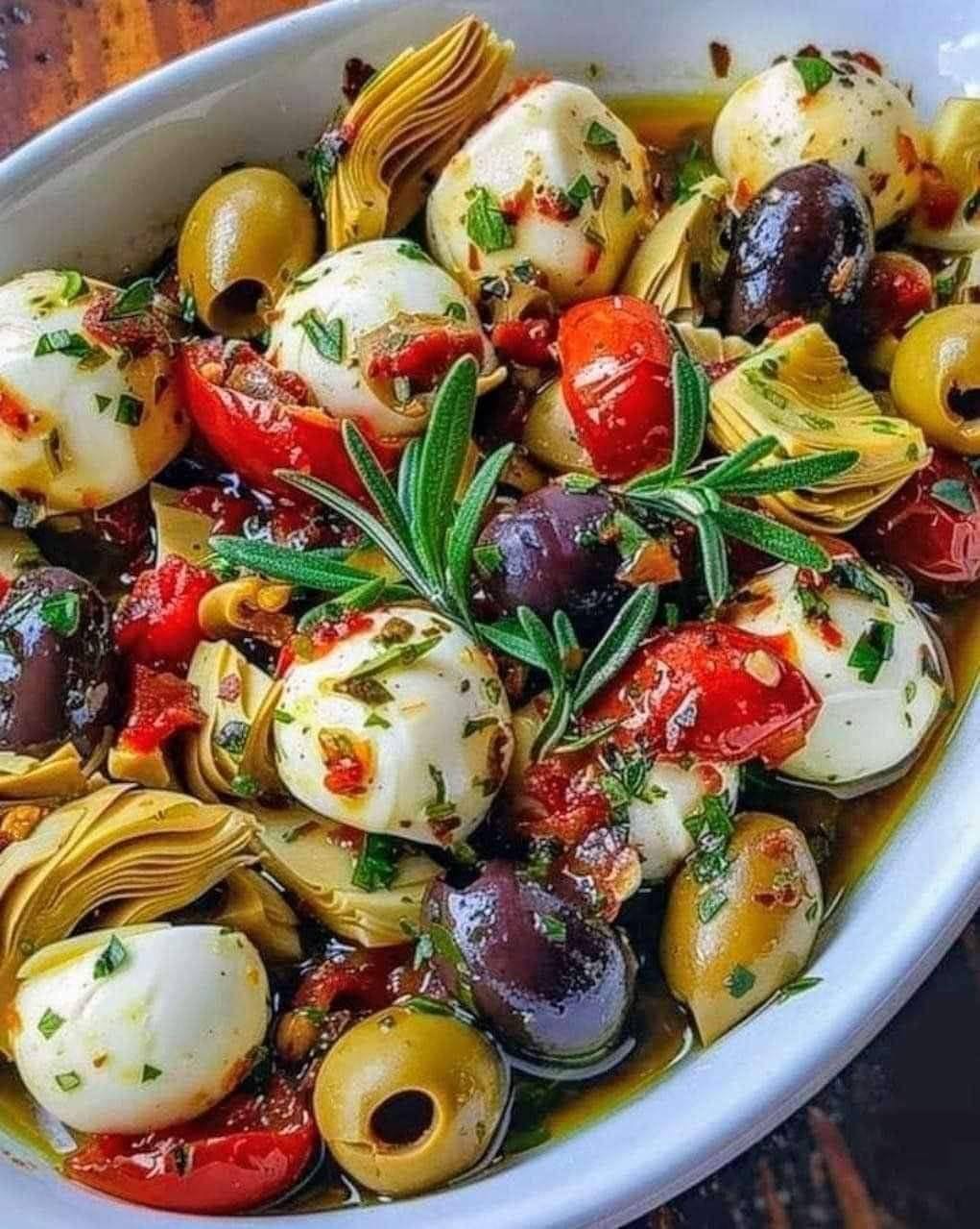 Quick and Tasty Marinated Mozzarella Balls, Artichokes, and Olives Appetizer Recipe