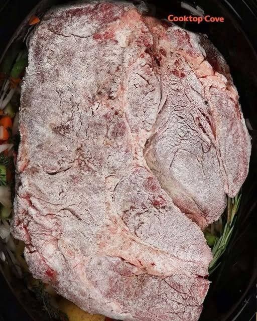 Cover beef with flour and put it in a slow cooker. You’ll love it when it’s done