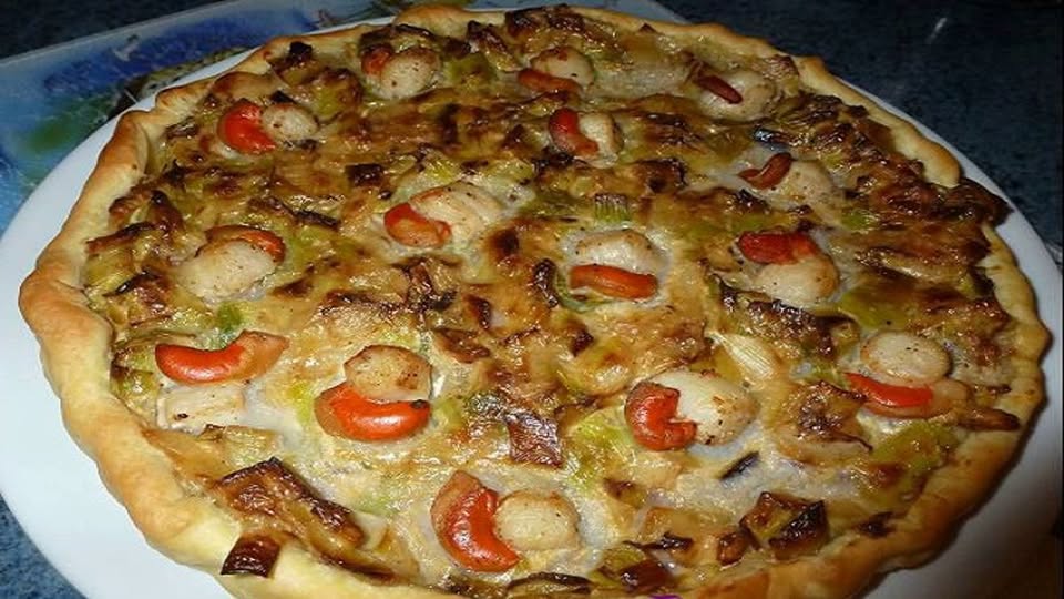 Quiche with scallops and vegetables