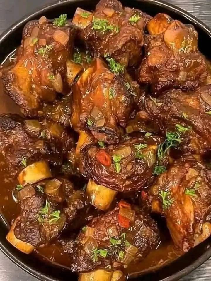 Savory Braised Oxtails with Herb Infused Sauce