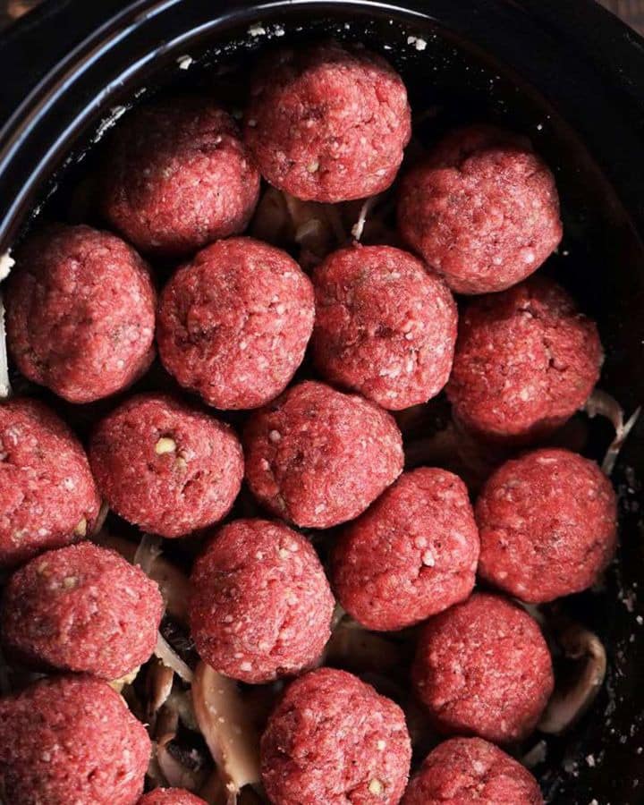 Put meatballs in a slow cooker & get ready to enjoy a tasty dinner